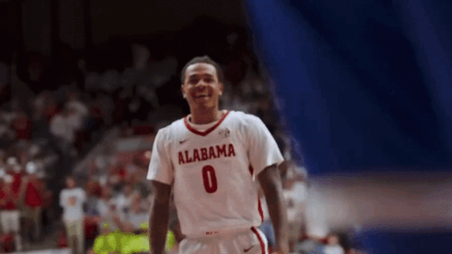 Alabama Basketball Player In White Jersey Number 0 GIF