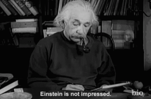 Albert Einstein Smoking Pipe at Desk