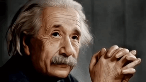 Albert Einstein With Hands Folded in Front of Face