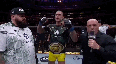 Alex Pereira Flexing Belt Winning GIF