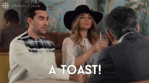 Alexis Rose Giving A Toast GIF