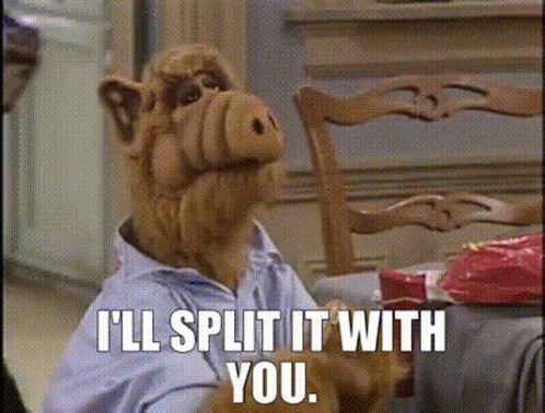 Alf From The Show Sits At A Table With A Cake And Says I 'Ll Split It With You GIF