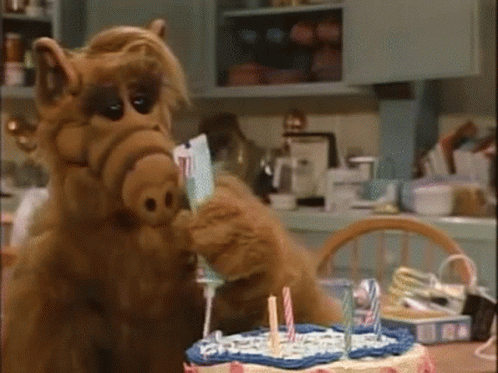 Alf Squeezing Toothpaste On Cake GIF