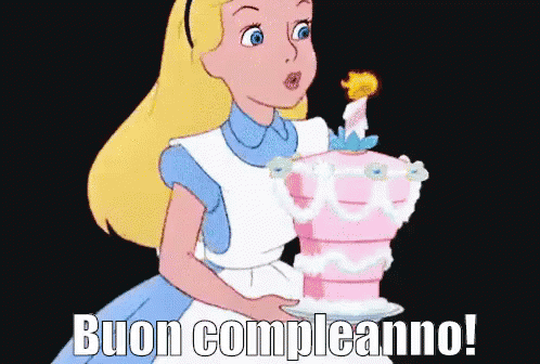 Alice In Wonderland Blowing Out Candle On Cake GIF