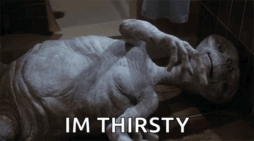 Alien Laying on Floor Saying Im Thirsty