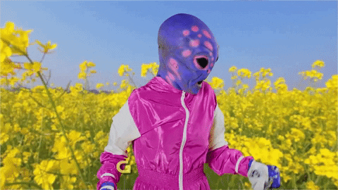 Alien Mascot Sneeze During Spring GIF