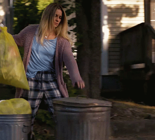 Allison Mcroberts Throwing Garbage GIF