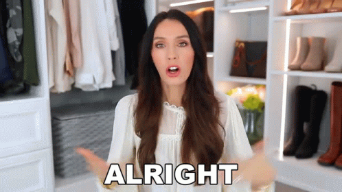 Lady In White Saying Alright GIF