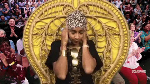Amanda Seales Ear Plugs With Gold Bracelet GIF