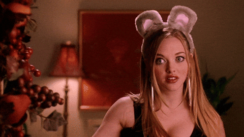 Amanda Seyfried Points Her Head Duhhh GIF