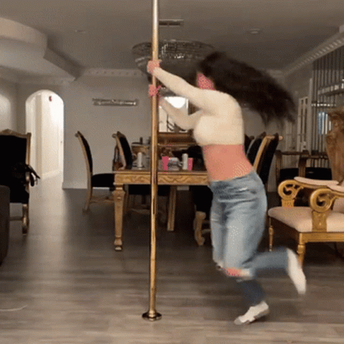 Amateur Latina Tries Pole Dancing GIF