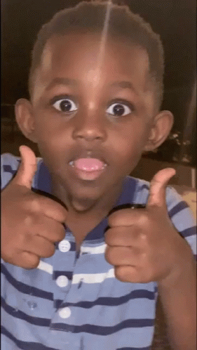 Amazed Kid Giving Thumbs Up GIF