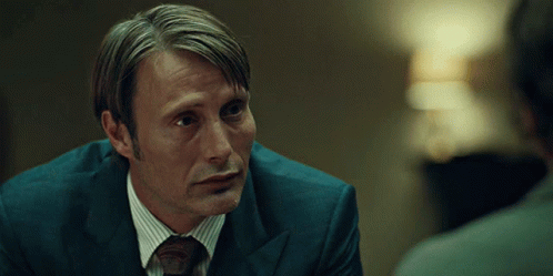Amazing Sad Smiling Hannibal Mads Mekkelsen GIF