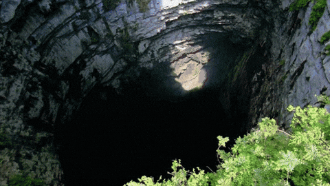 Amazing Shot Paragliding In Goblin Cave GIF