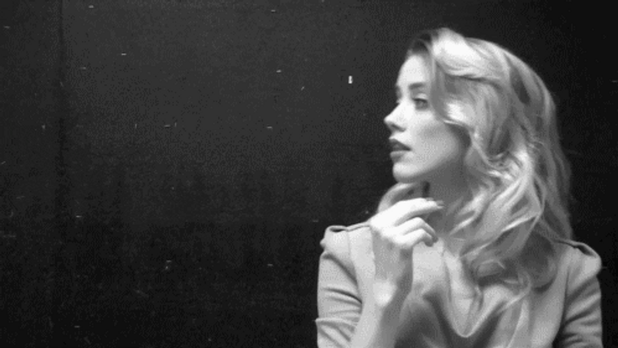 Amber Heard Pointing Her Chin GIF
