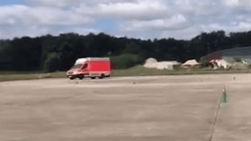 Ambulance Drifting Then Falling GIF