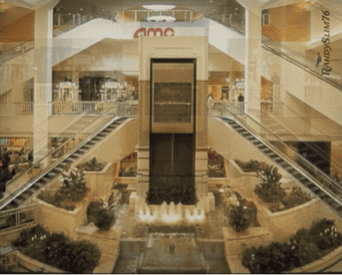 AMC Sign Above Escalators in Mall