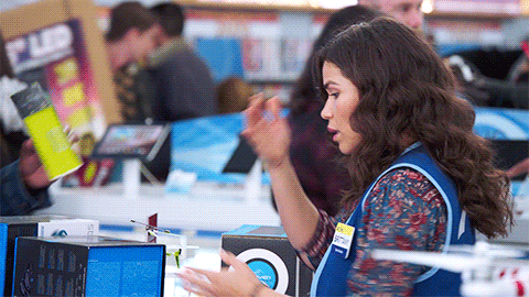 America Ferrera Having Headche On Black Friday GIF