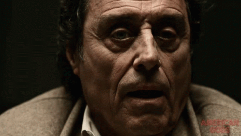American Gods Mr Wednesday Looking Sideways GIF