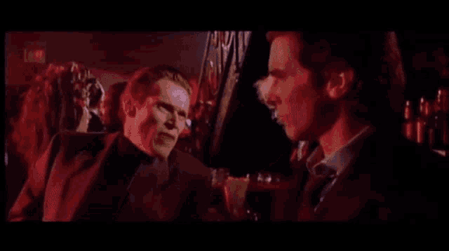 American Psycho Christian Bale Willem Dafoe GIF