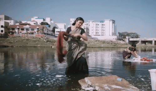Amma Kanakku Doing Laundry In The River GIF