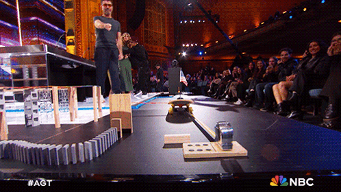 Amusing Huge Park Dominos Falling GIF