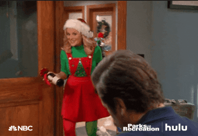 Amy Poehler Christmas Elf With Wines GIF