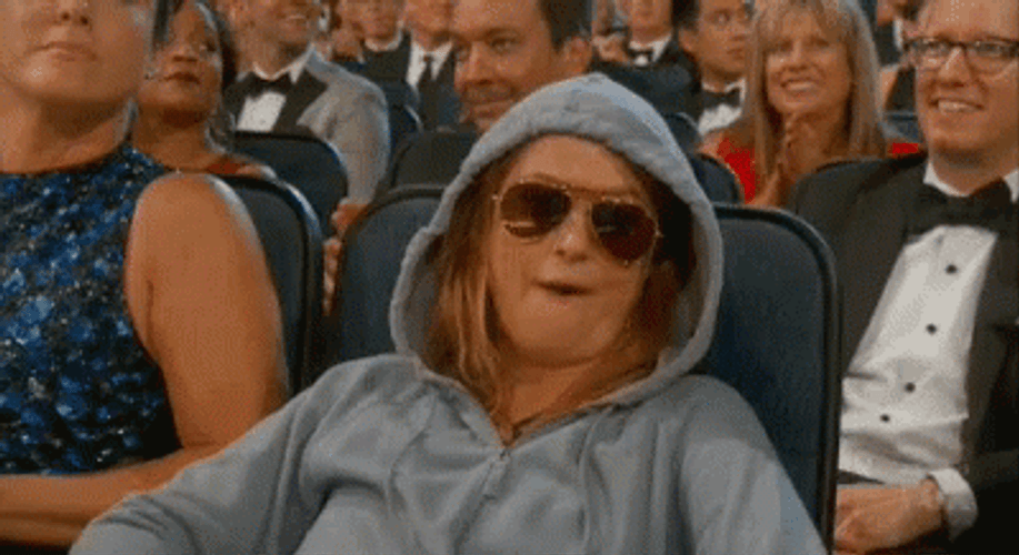 Amy Poehler Hood Up Peace Sign GIF