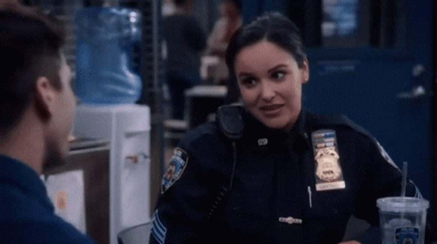 Amy Santiago Nervous Laugh GIF