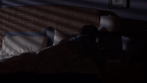 Amy Waking Up With Phone Call GIF