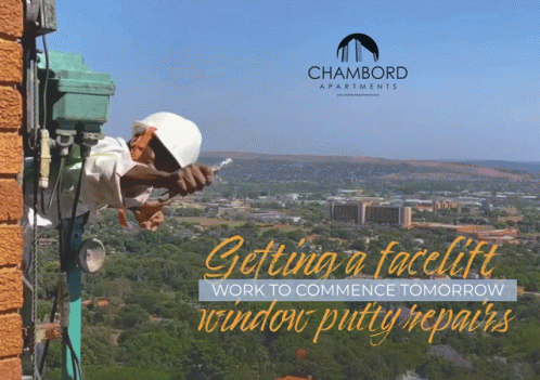 An Ad For Chambord Apartments Shows A Man Working On A Brick Wall GIF