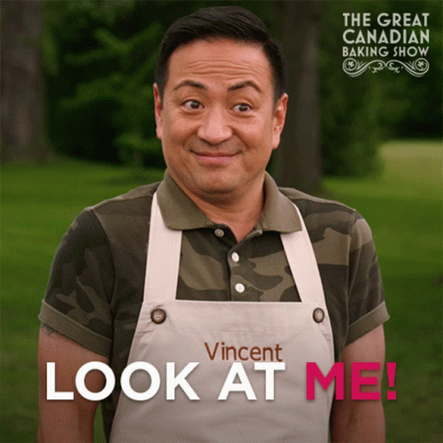 An Ad For The Great Canadian Baking Show Shows A Man Wearing An Apron GIF