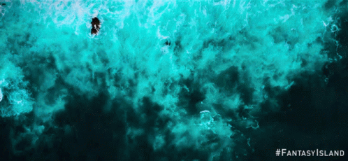An Advertisement For Fantasy Island Shows A Person Swimming In The Water GIF