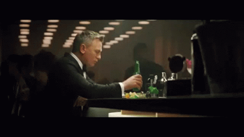 An Advertisement For Heineken Shows A Man In A Tuxedo GIF
