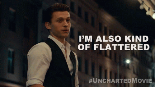 An Advertisement For The Uncharted Movie Shows A Man In A Suit GIF