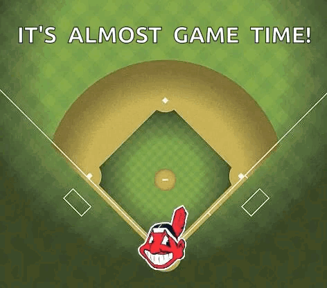 an aerial view of a baseball field with the cleveland indians logo on the outfield wall .