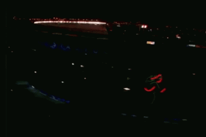 An Aerial View Of A Baseball Stadium With A Budweiser Banner GIF