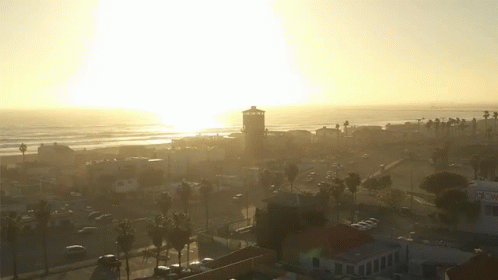 An Aerial View Of A Beach With A Cnn Sign In The Foreground GIF
