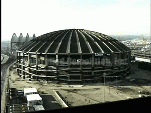 An Aerial View Of A Building Under Construction With The Words Demolition In The Upper Right Corner GIF