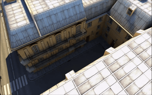An Aerial View Of A Building With A Roof That Has A Lot Of Windows GIF