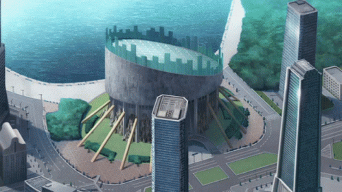 An Aerial View Of A City With A Large Building In The Middle Of The City GIF