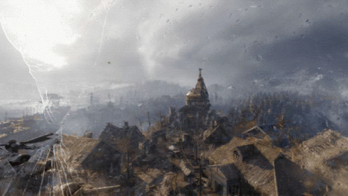 An Aerial View Of A City With A Tower In The Background GIF