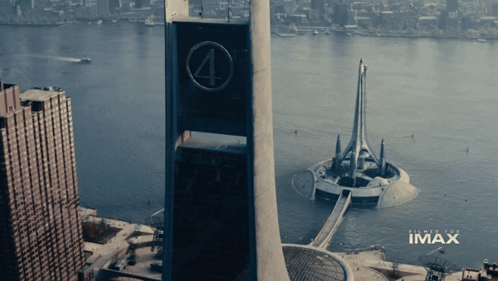 An Aerial View Of A City With Imax Written On The Bottom GIF