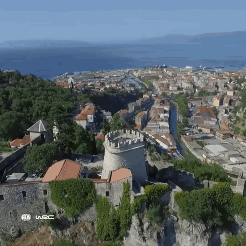 An Aerial View Of A City With The Words Fia W2c On The Bottom Right GIF