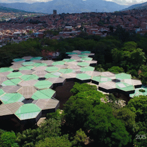 An Aerial View Of A City With The Year 2015 GIF