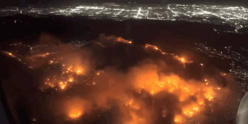 An Aerial View Of A Fire At Night GIF
