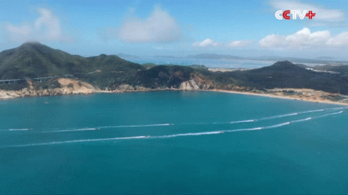 An Aerial View Of A Large Body Of Water With A Cctv Logo On The Bottom GIF