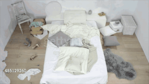 An Aerial View Of A Messy Bedroom With The Number 485129260 On The Bottom GIF