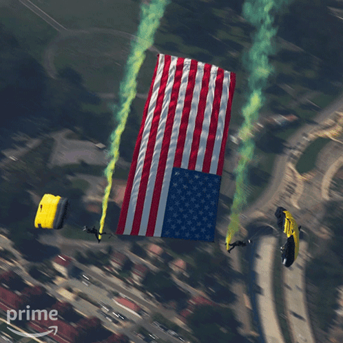 An Aerial View Of A Parachute With An American Flag On It GIF