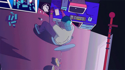 An Aerial View Of A Person Sitting At A Desk With A Computer And A Bowl Of Popcorn GIF
